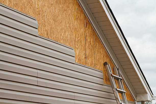 Professional Vinyl Siding technician working in Highland, NY